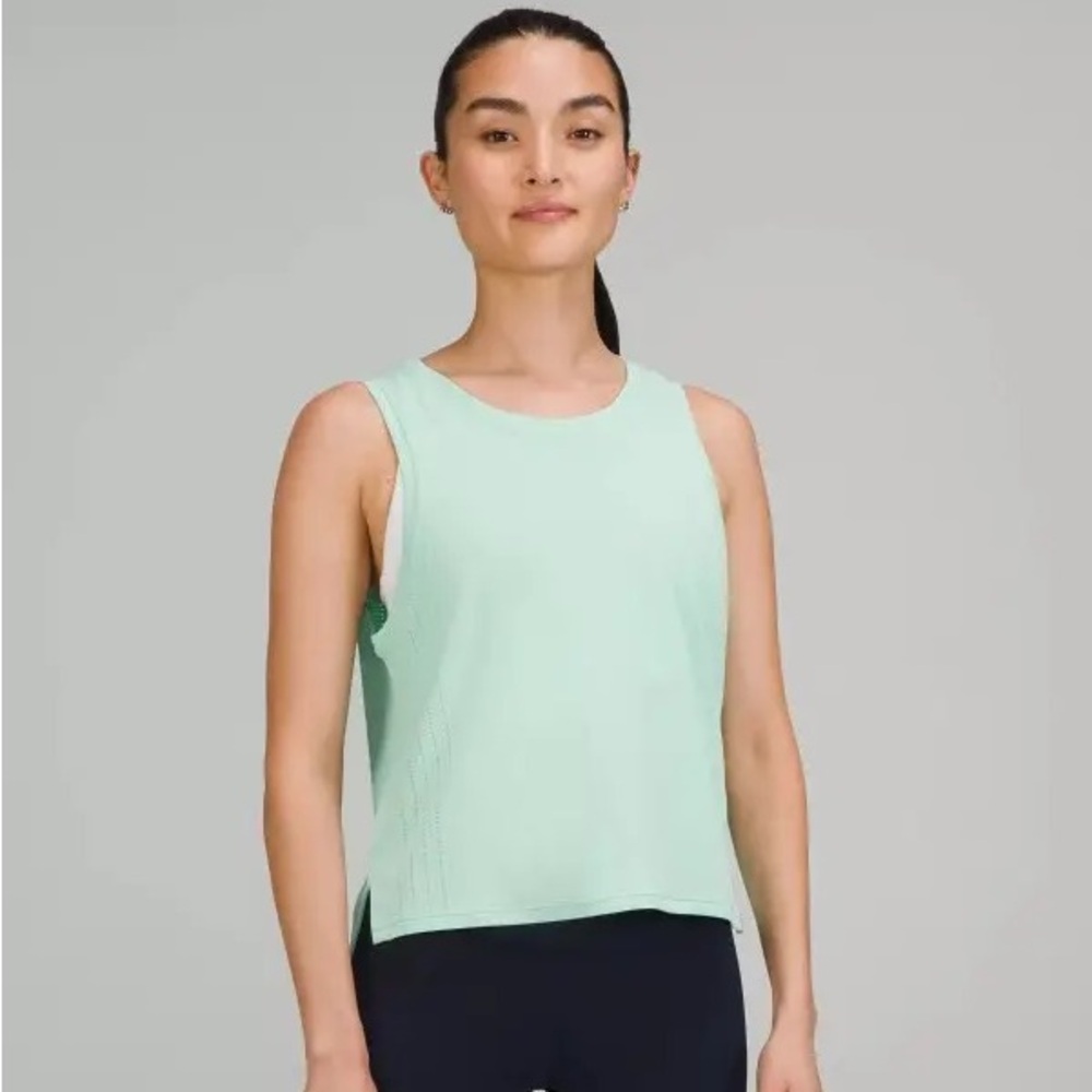 Mint green lululemon train to be tank top